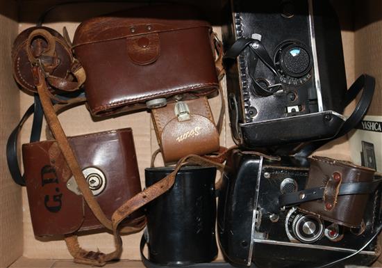 Two Yashica twin lens reflex cameras, and two Zeiss ikon cameras
